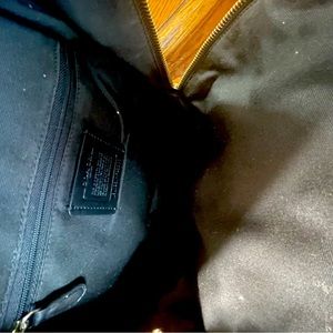 Brown and black and it is coach